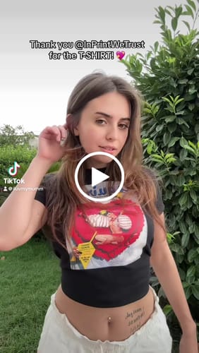 Customer video review of 'Unholy Woman' baby tee