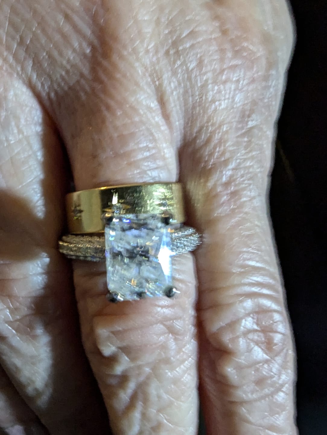 Customer photo review of Hidden Halo Radiant Moissanite Triple Row Pave Engagement Ring