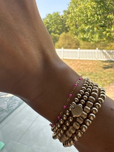 Customer photo review of pink daisy bracelet