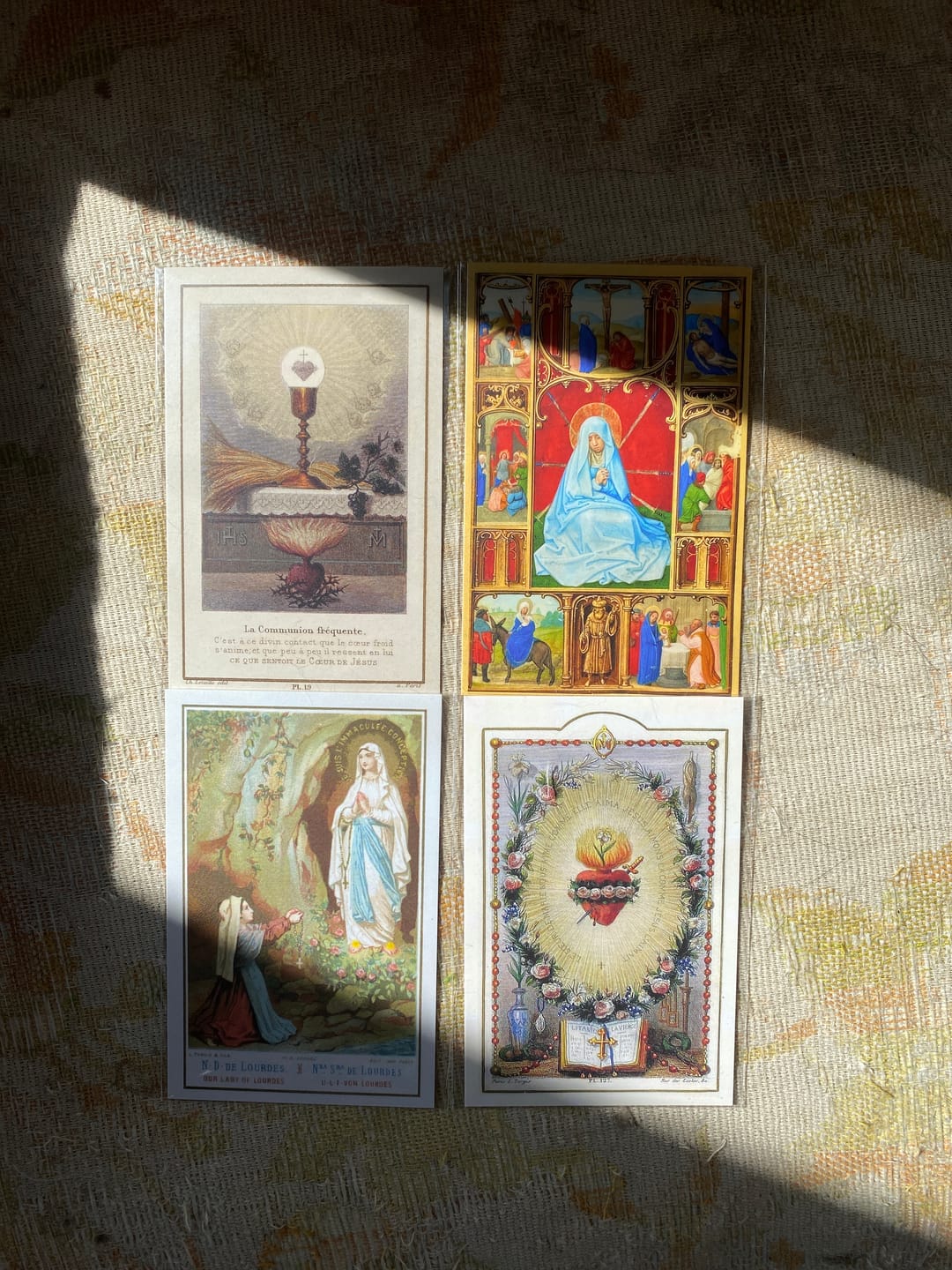 Customer photo review of New! 50 Restored Vintage Holy Cards – Variety Pack of 50 – Beautiful and Inspirational