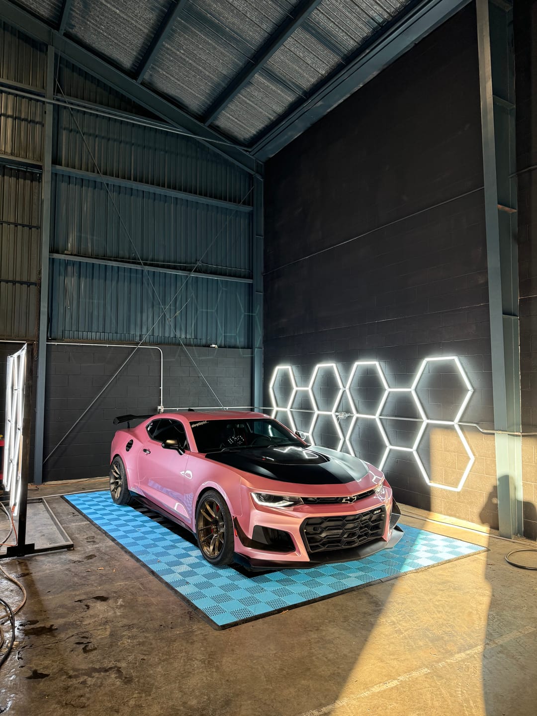 Customer photo review of Glossy Metallic Passion Pink Vinyl Wrap