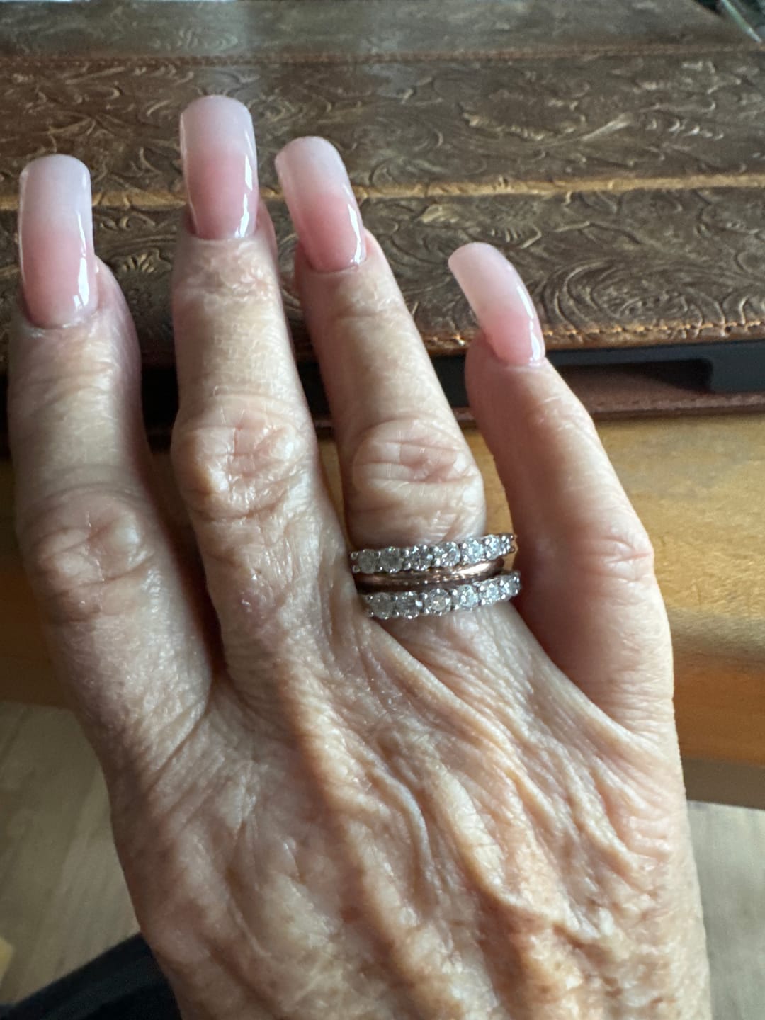 Customer photo review of Round Moissanite Sterling Silver Wedding Band Stackable Ring