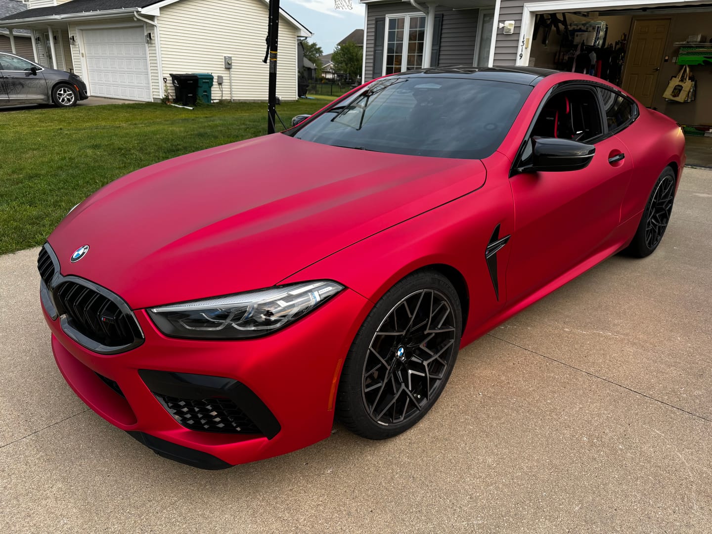 Customer photo review of Satin Chrome Prismatic Red Vinyl Wrap