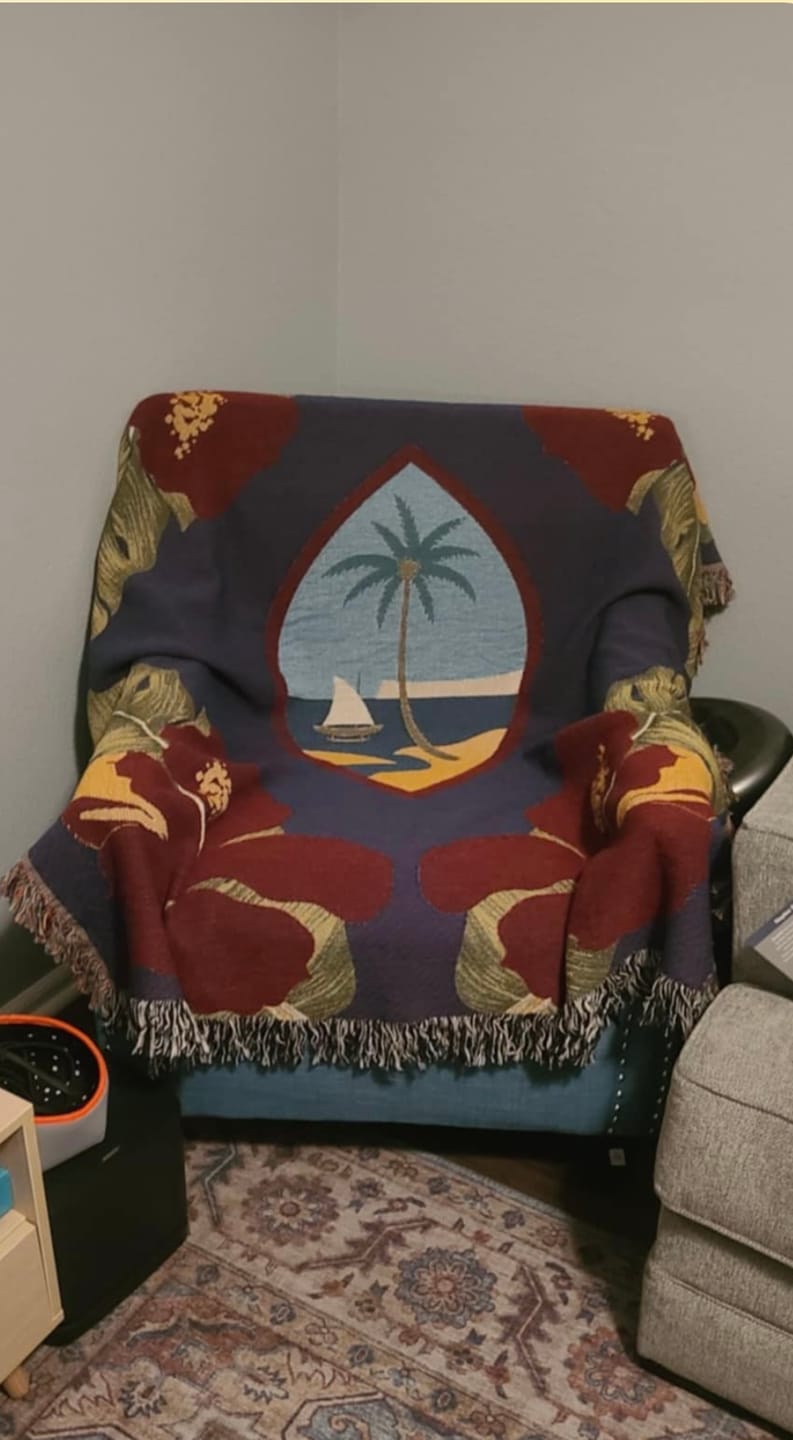Customer photo review of Guam Seal Hibiscus Paradise Woven Blanket