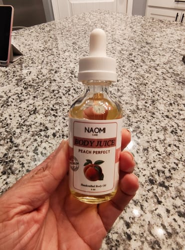 Customer photo review of BOGO Yummy Body Juice Oil