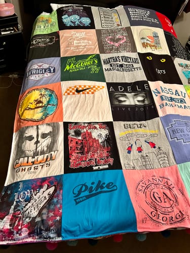 T-shirt quilt with travel, gaming themes by Edna from TN