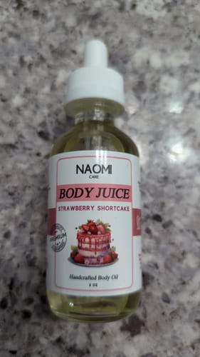 Customer photo review of BOGO Yummy Body Juice Oil