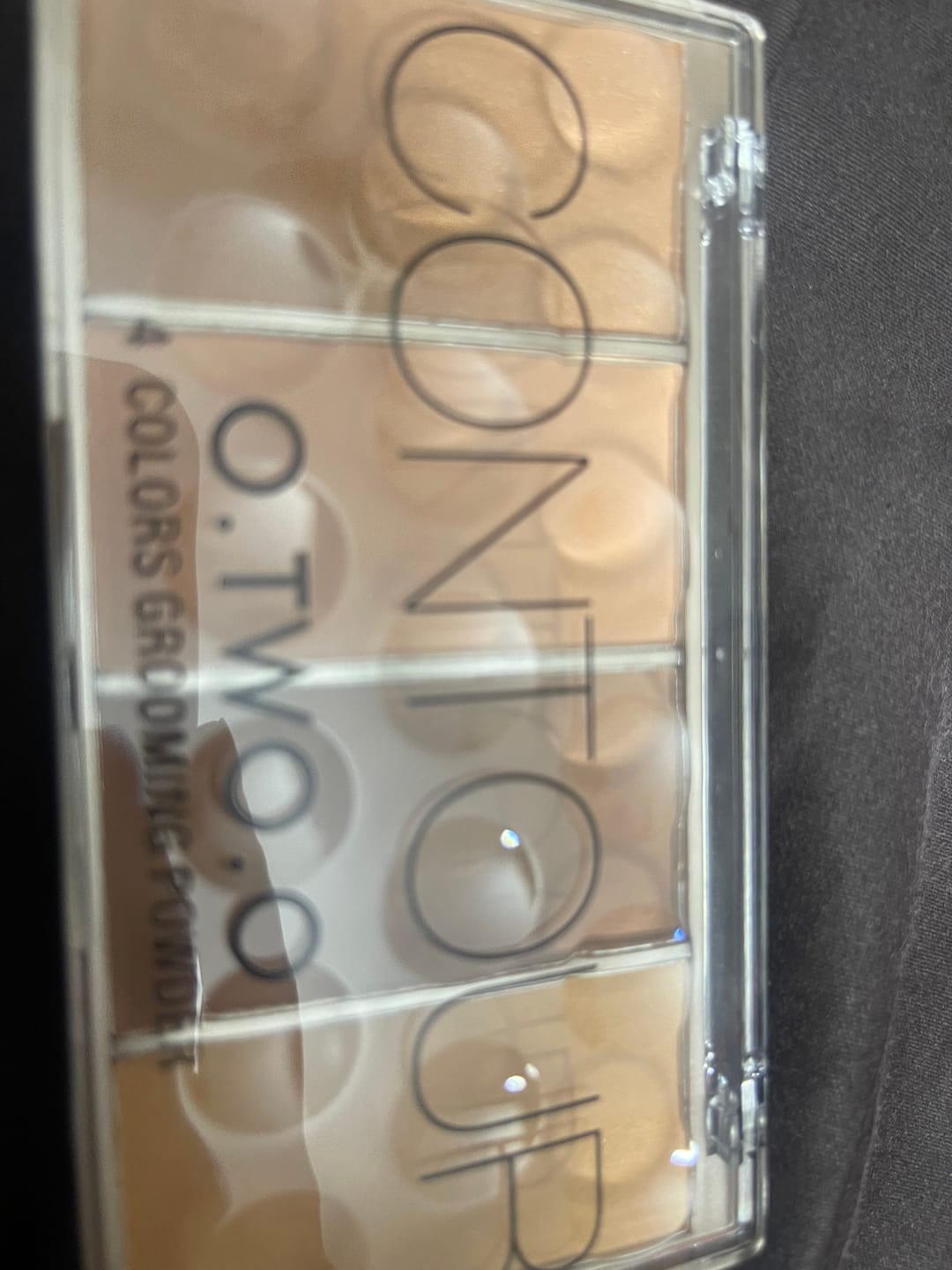 Customer photo review of O.TWO.O 4 COLORS GROOMING POWDER