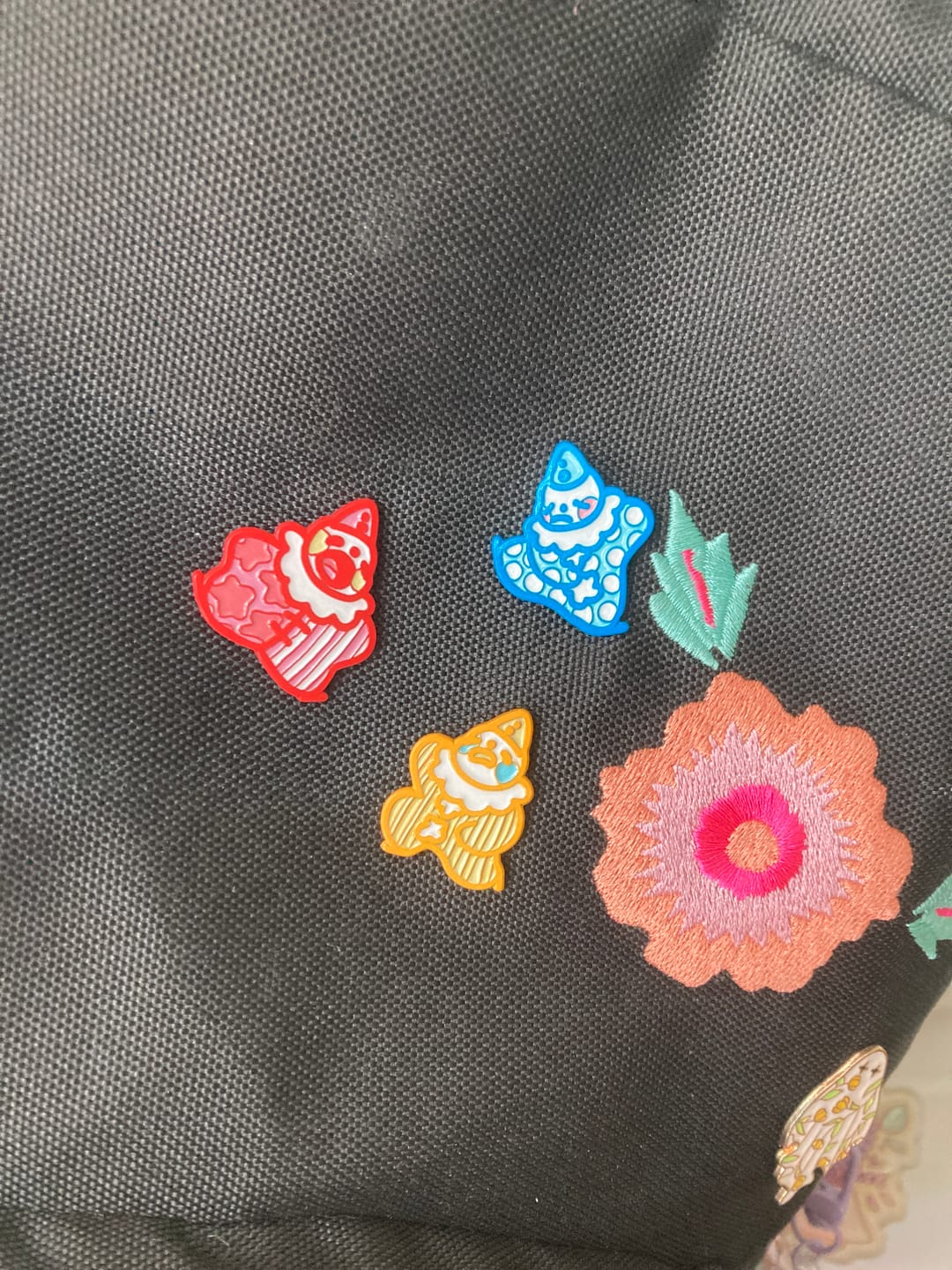 Customer photo review of Cute Lil Clown Enamel Pins