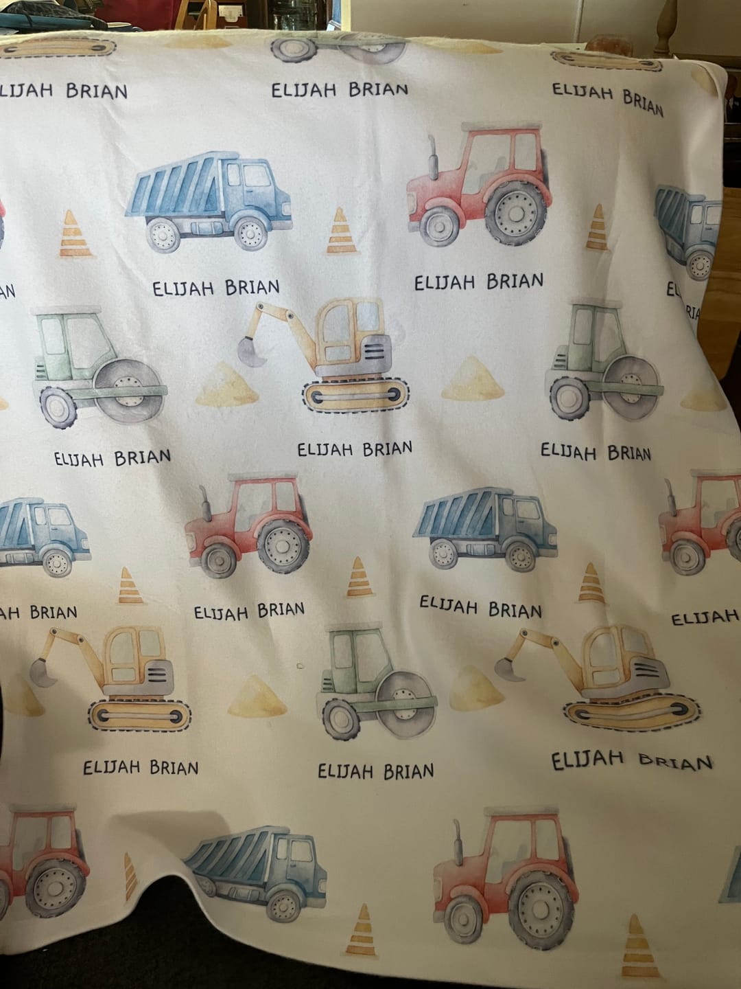 Customer photo review of Trucks personalized baby boy blanket