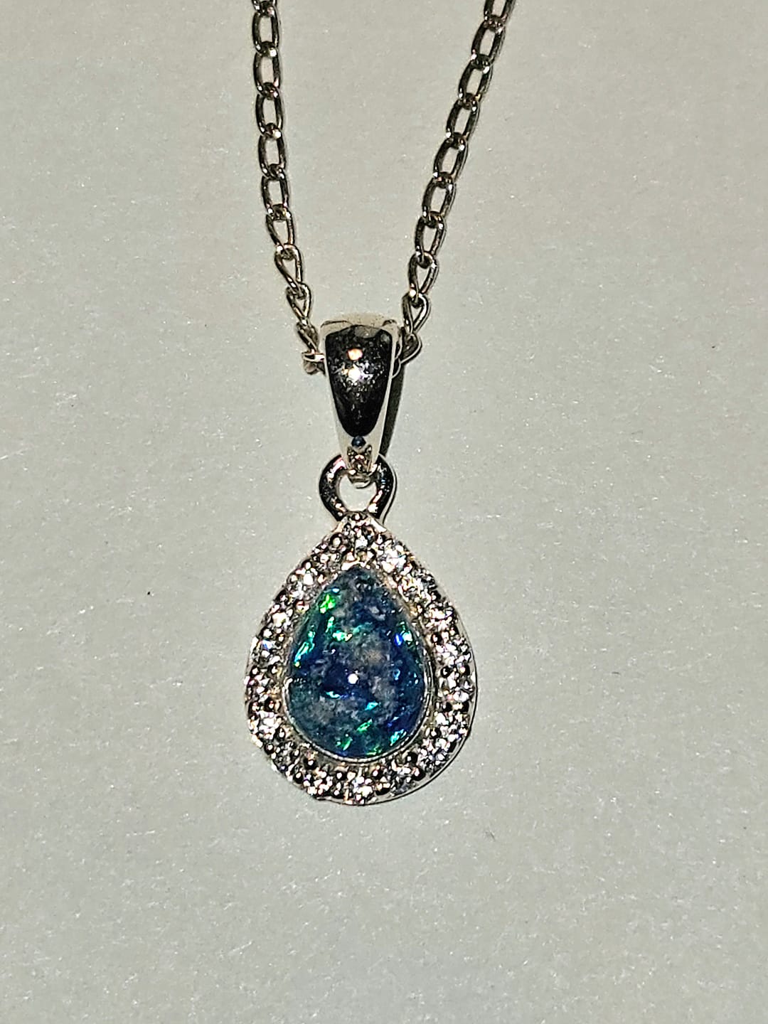 Customer photo review of Dainty Bedazzled Drop Pendant with Cremation Ashes