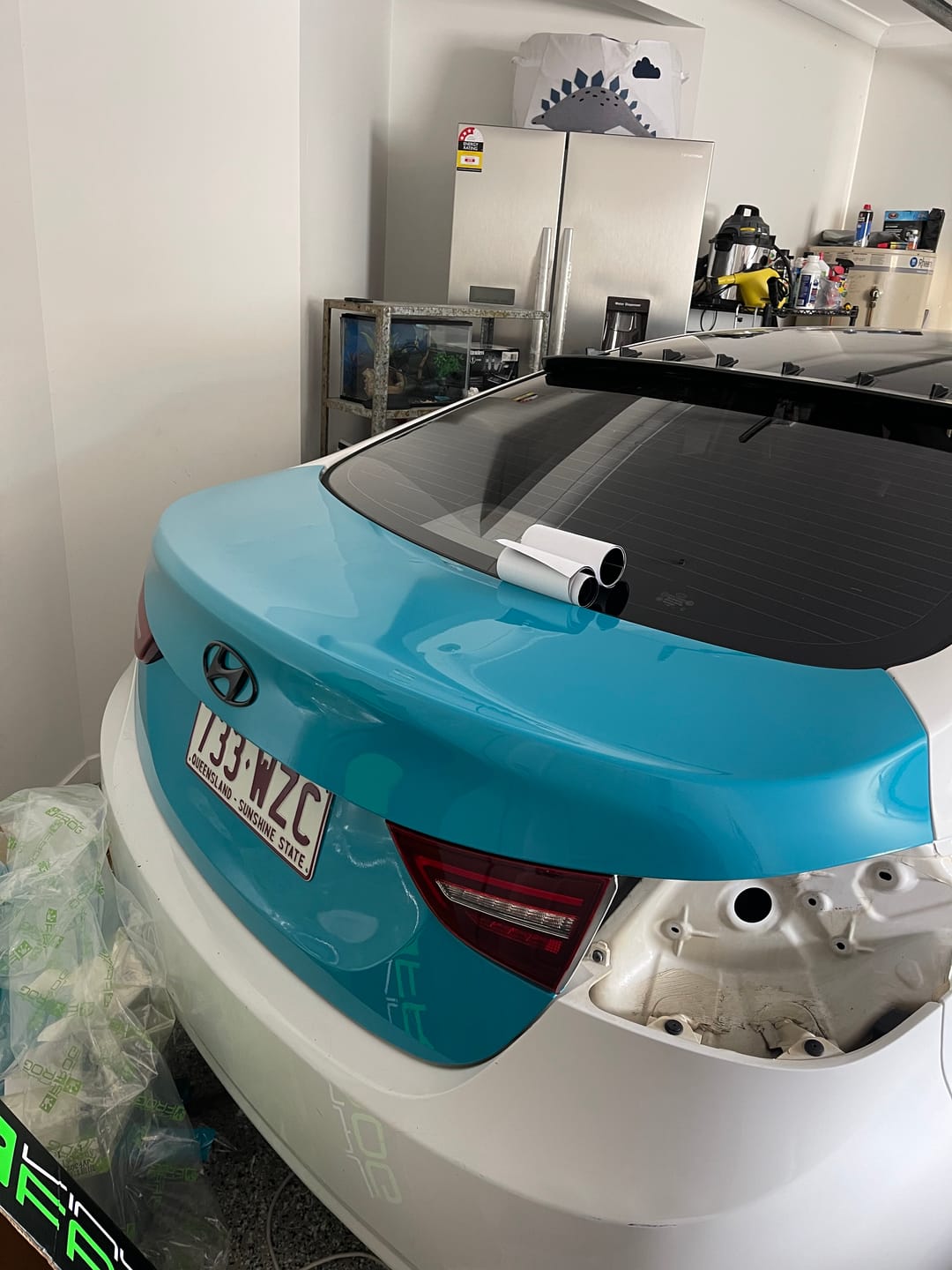 Customer photo review of High Glossy Miami Blue Vinyl Wrap