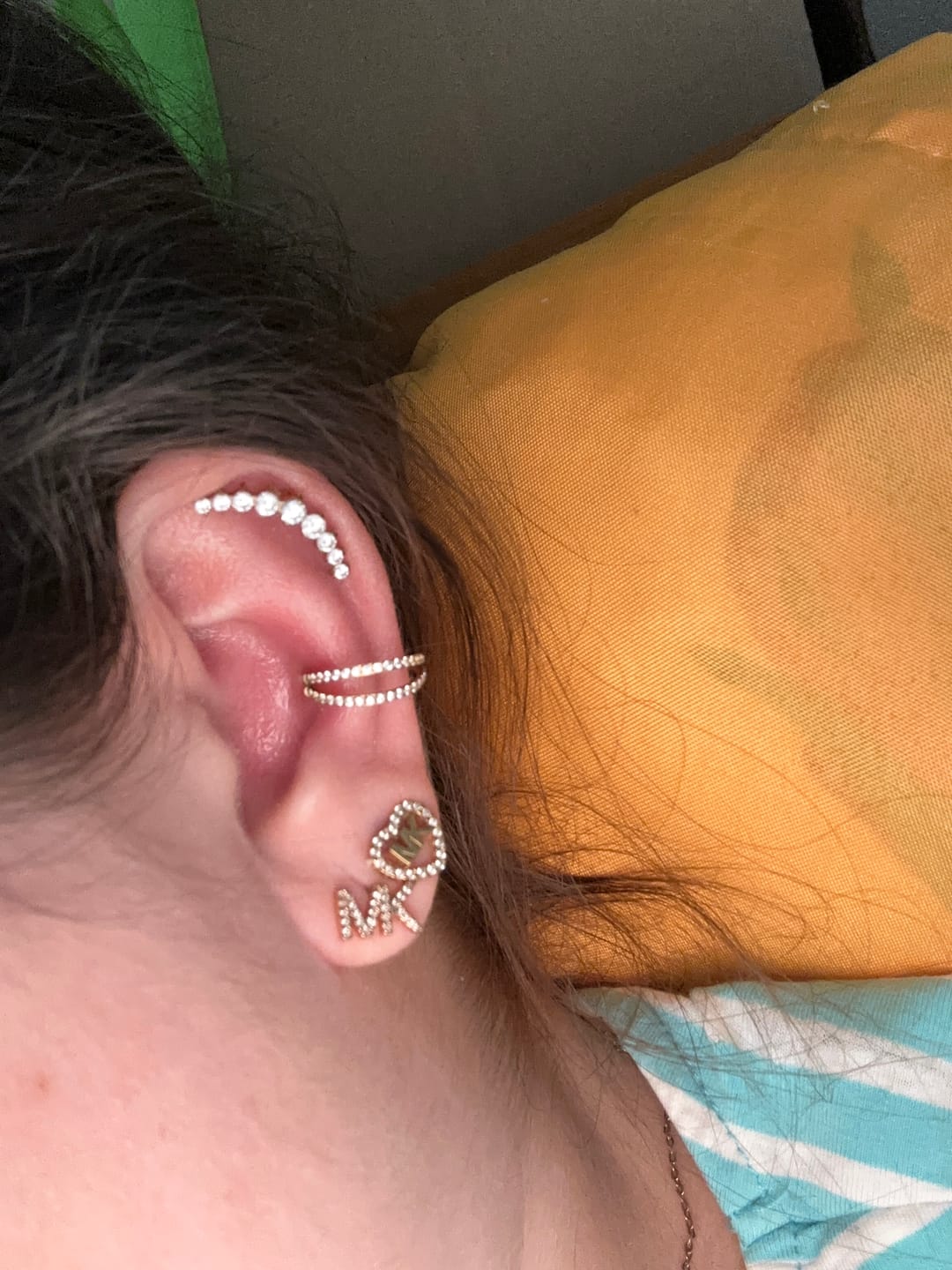 Customer photo review of Double Clicker Piercing | Titan