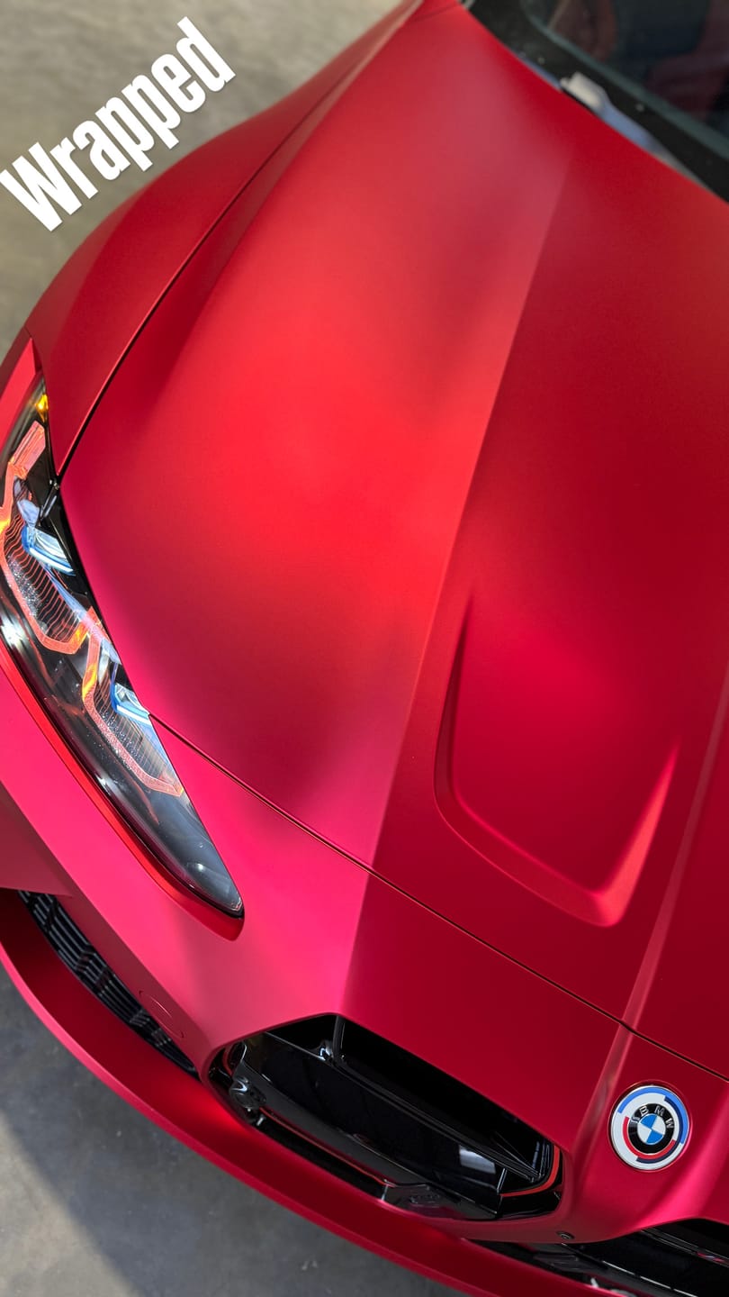 Customer photo review of Satin Chrome Prismatic Red Vinyl Wrap