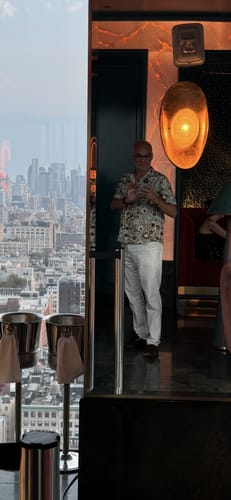 Customer photo review of Men's Vintage Floral Summer Cotton Button Up Breathable Short Sleeve Hawaiian Shirt