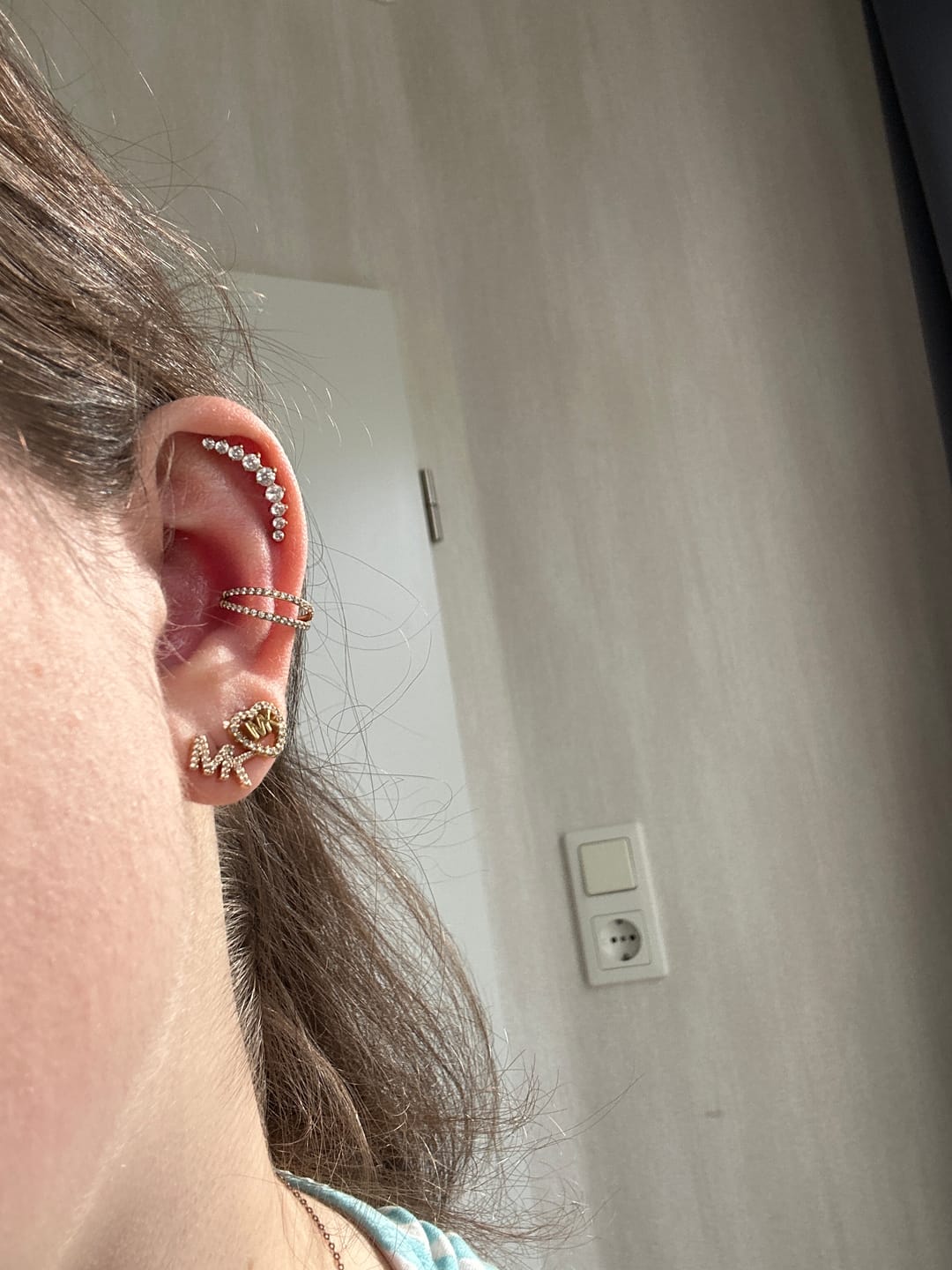 Customer photo review of Bright Bow Piercing | Titan