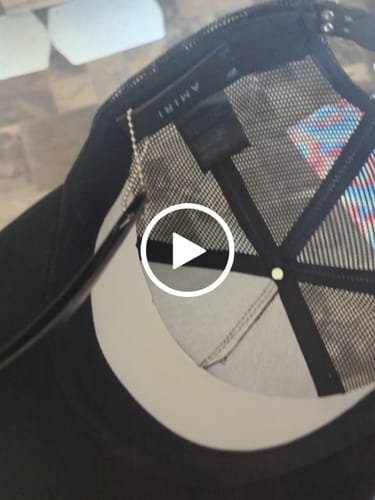 Customer video review of AMIRI LOGO TRUCKER CAPS
