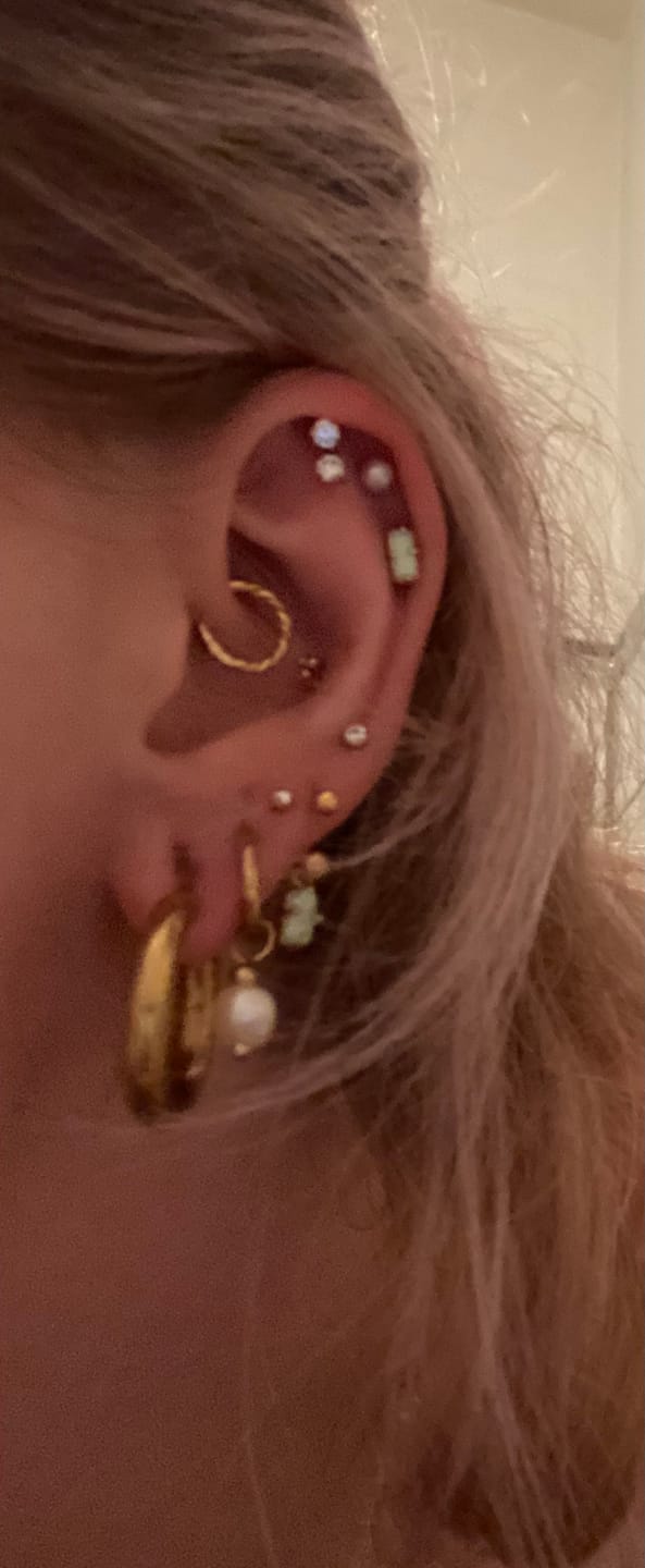 Customer photo review of Hanging Shine Piercing | Titan