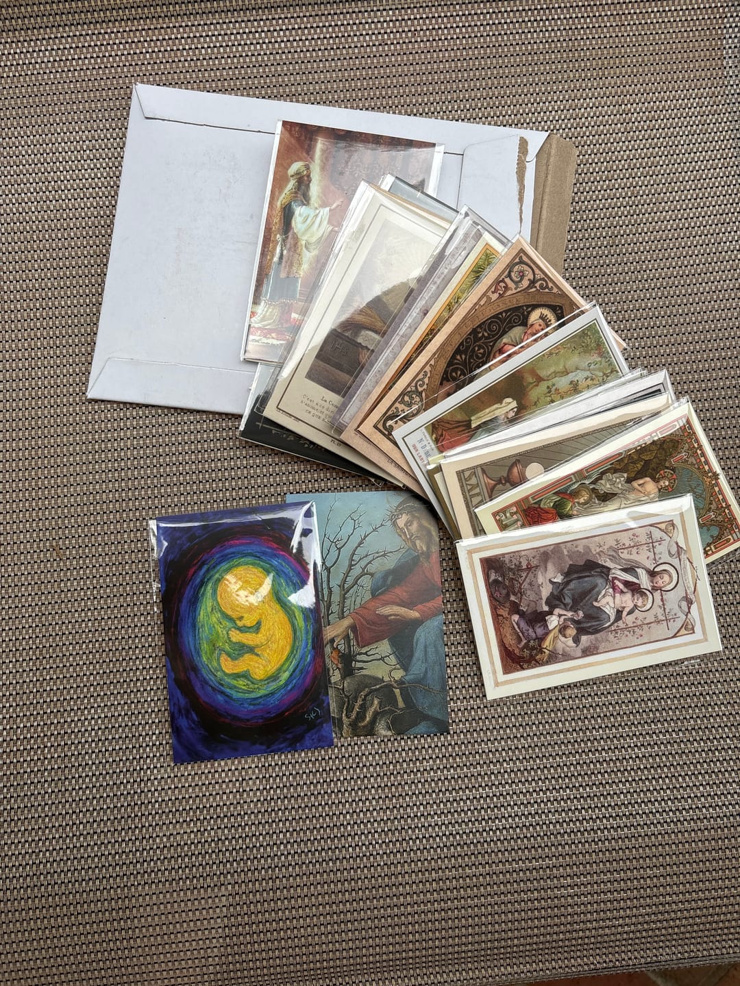 Customer photo review of New! 50 Restored Vintage Holy Cards – Variety Pack of 50 – Beautiful and Inspirational