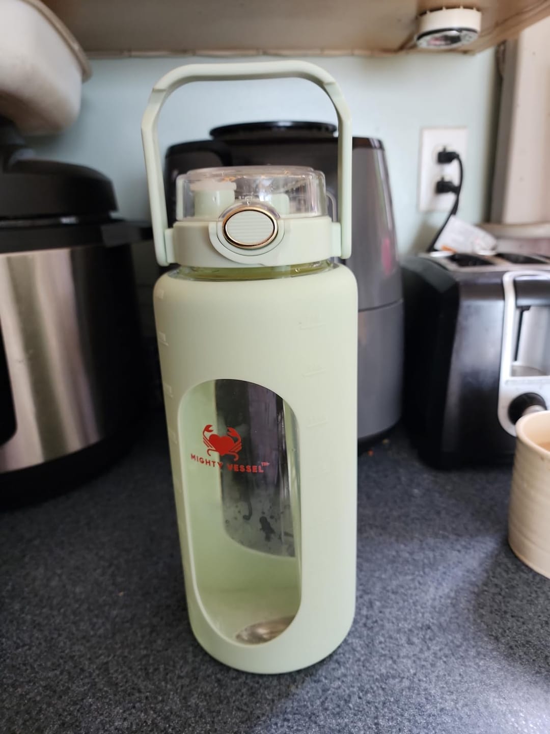 Customer photo review of MIGHTY VESSEL™ SHATTER-RESISTANT GLASS WATER BOTTLE | 64 OZ
