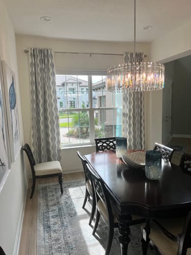 Customer photo review of SmartWings Hardwired Motorized Roller Shades 100% Blackout Safari