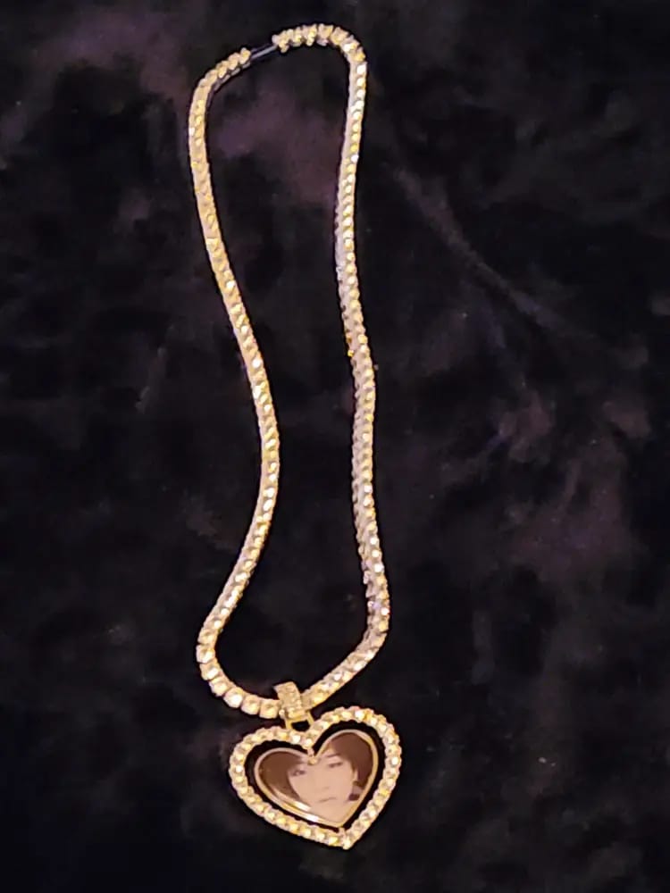Customer photo review of 3D SPINNING 2-FACED HEART CUSTOM PICTURE PENDANT