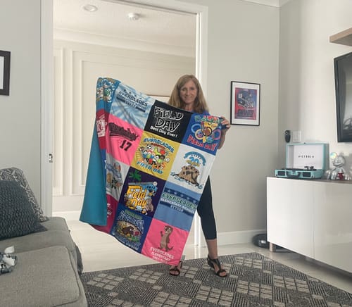 T-shirt quilt with team sports, outdoor activities themes by Helene from FL