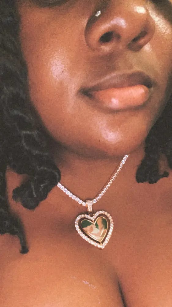 Customer photo review of 3D SPINNING 2-FACED HEART CUSTOM PICTURE PENDANT