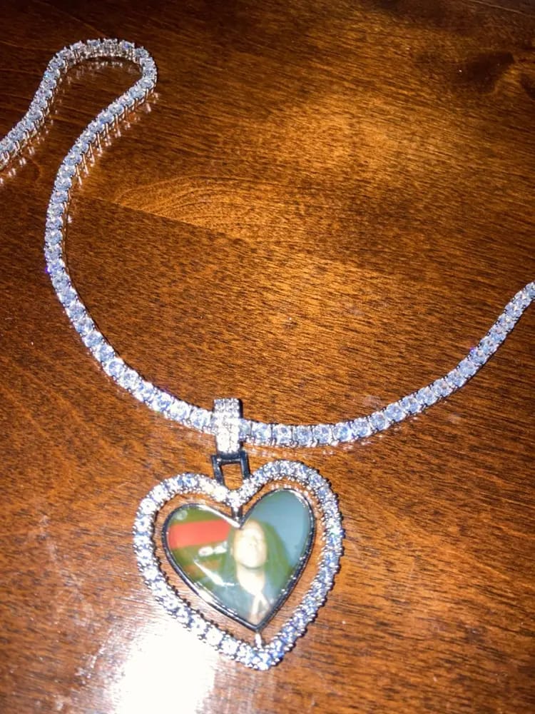Customer photo review of 3D SPINNING 2-FACED HEART CUSTOM PICTURE PENDANT