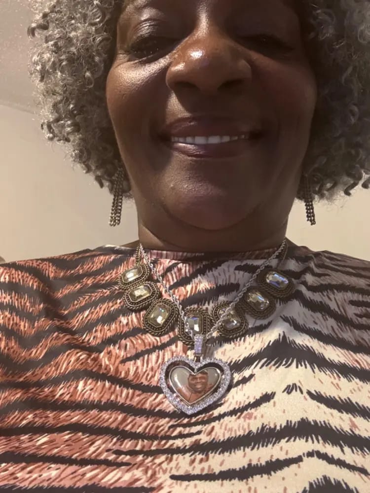 Customer photo review of 3D SPINNING 2-FACED HEART CUSTOM PICTURE PENDANT