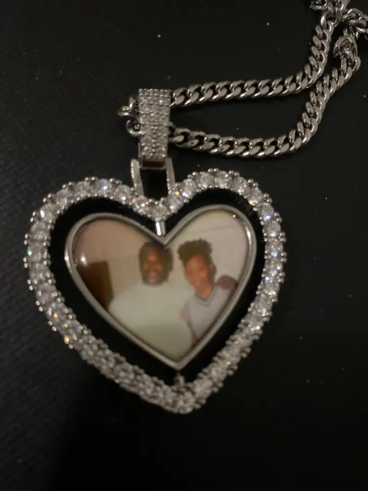 Customer photo review of 3D SPINNING 2-FACED HEART CUSTOM PICTURE PENDANT