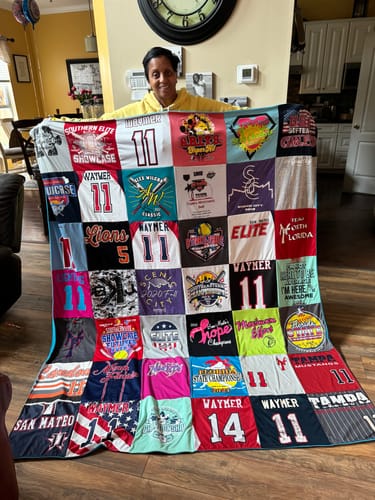 T-shirt quilt featuring bulldogs, lions by Sandra from FL