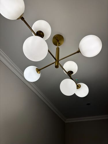 Customer photo review of 8-Light Linear Sputnik Frosted Glass Globe Chandelier