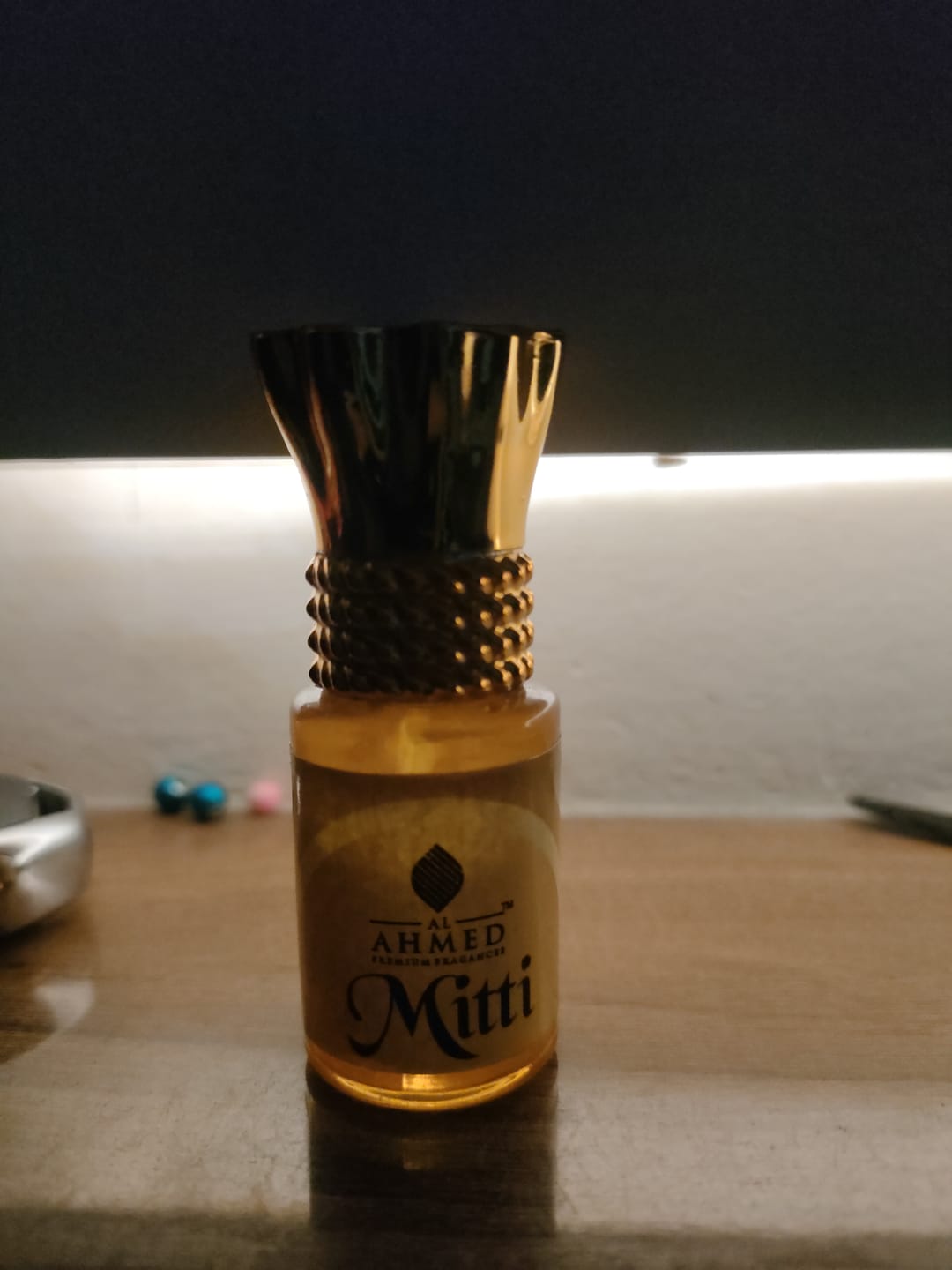 Customer photo review of Al Ahmed Mitti Attar | 100% Natural Fragrance, Alcohol Free Pure and Natural Long Lasting Attaer For Unisex Men & Women | (6ml)