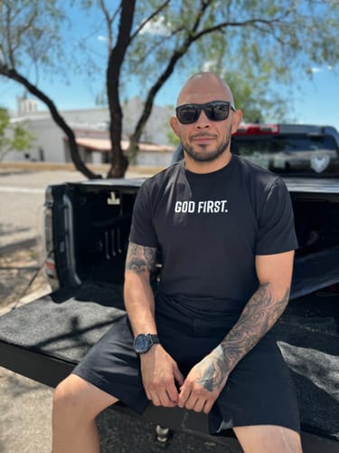 Customer photo review of God First Performance Tee