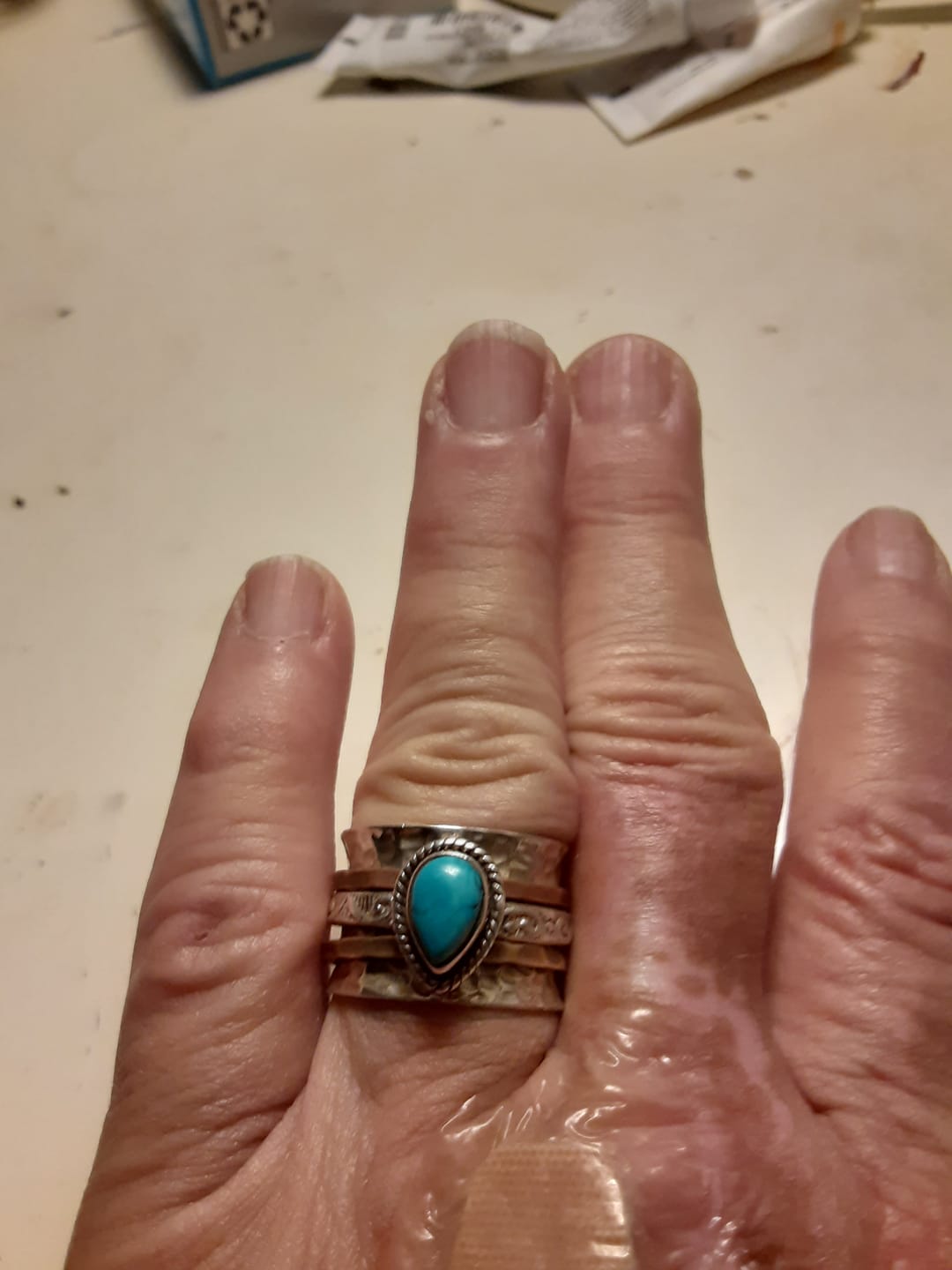 Customer photo review of Teardrop Turquoise Fidget Ring Sterling Silver