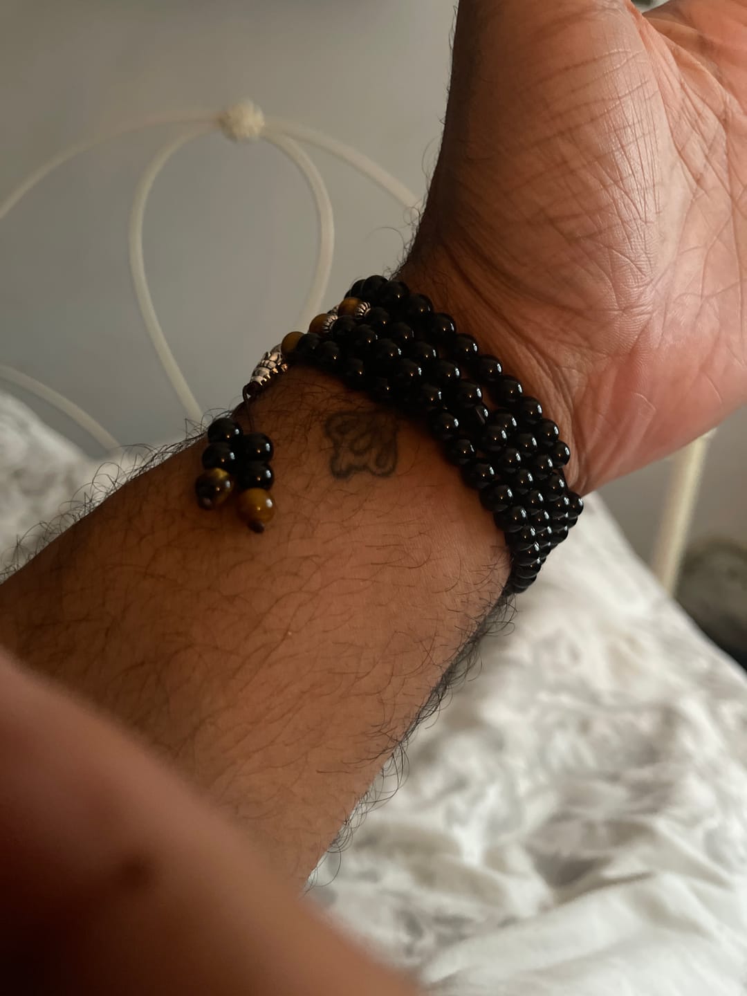 Customer photo review of Buddha Stones Black Obsidian Tiger Eye Blessing Mala Bracelet