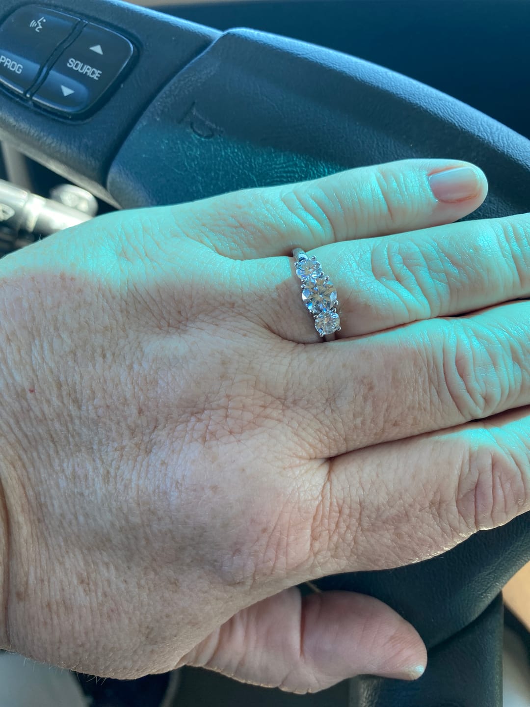 Customer photo review of Round Sona Diamond Sterling Silver Wedding Band Eternity Ring