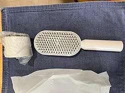 Customer photo review of QuickClean Kammen™ - Fjerner øjeblikkeligt fastsiddende hår og masserer blidt din hovedbund