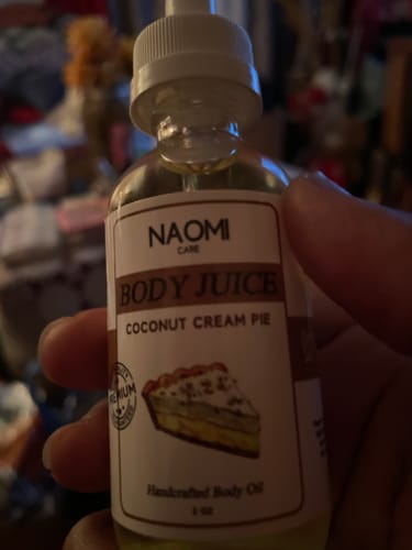 Customer photo review of Naomi Body Juice Oil