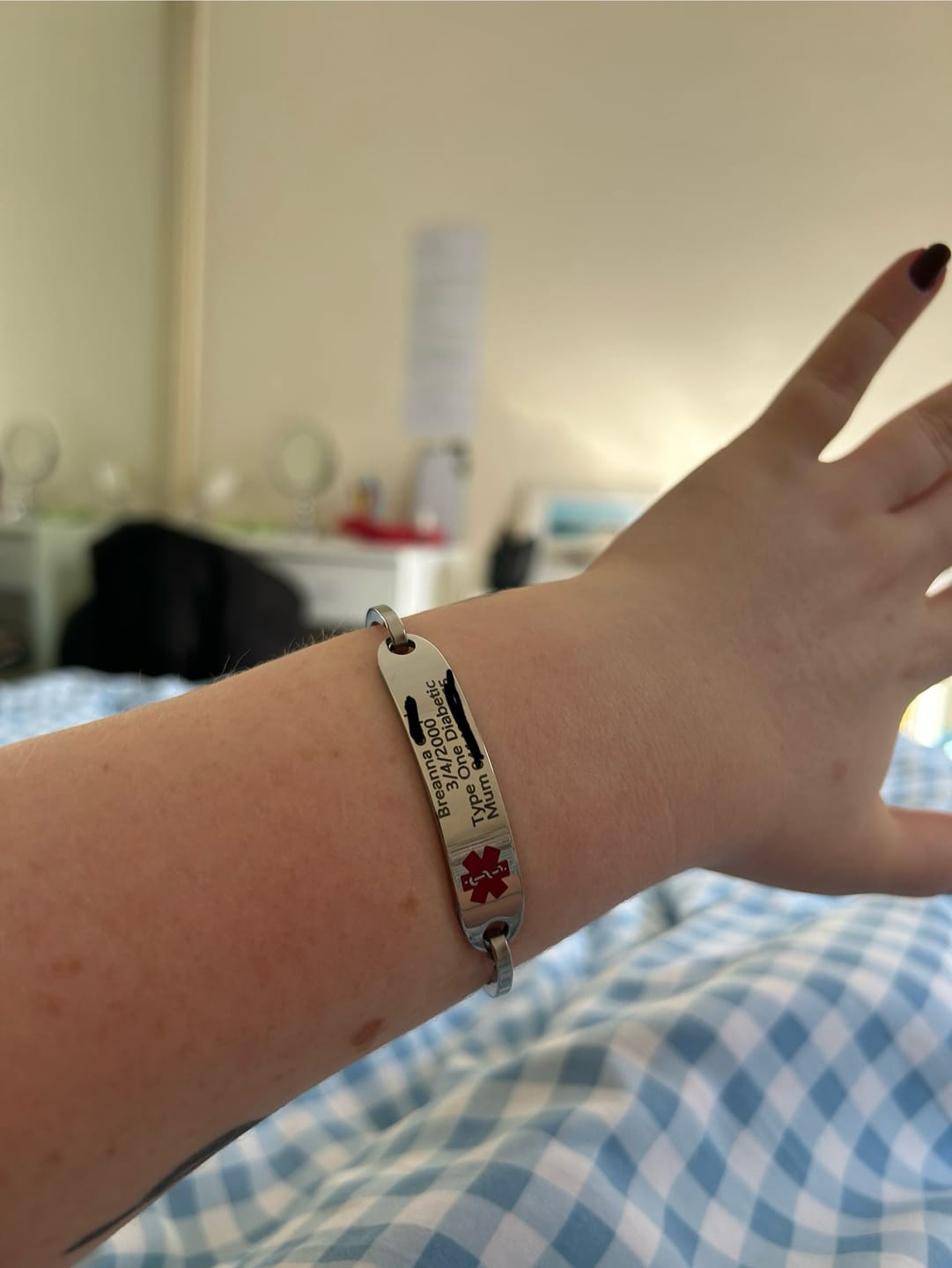 Customer photo review of Personalised Silver Medical Alert ID Bangle Bracelet