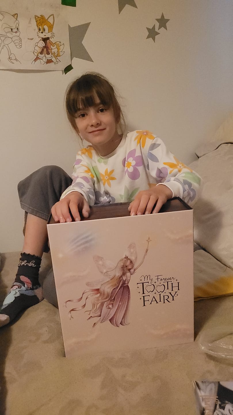 Customer photo review of My Forever Tooth Fairy Gift Set - Includes Storybook, Tooth Fairy Doll, Tooth Tote & Light Up Dis'Play' Case