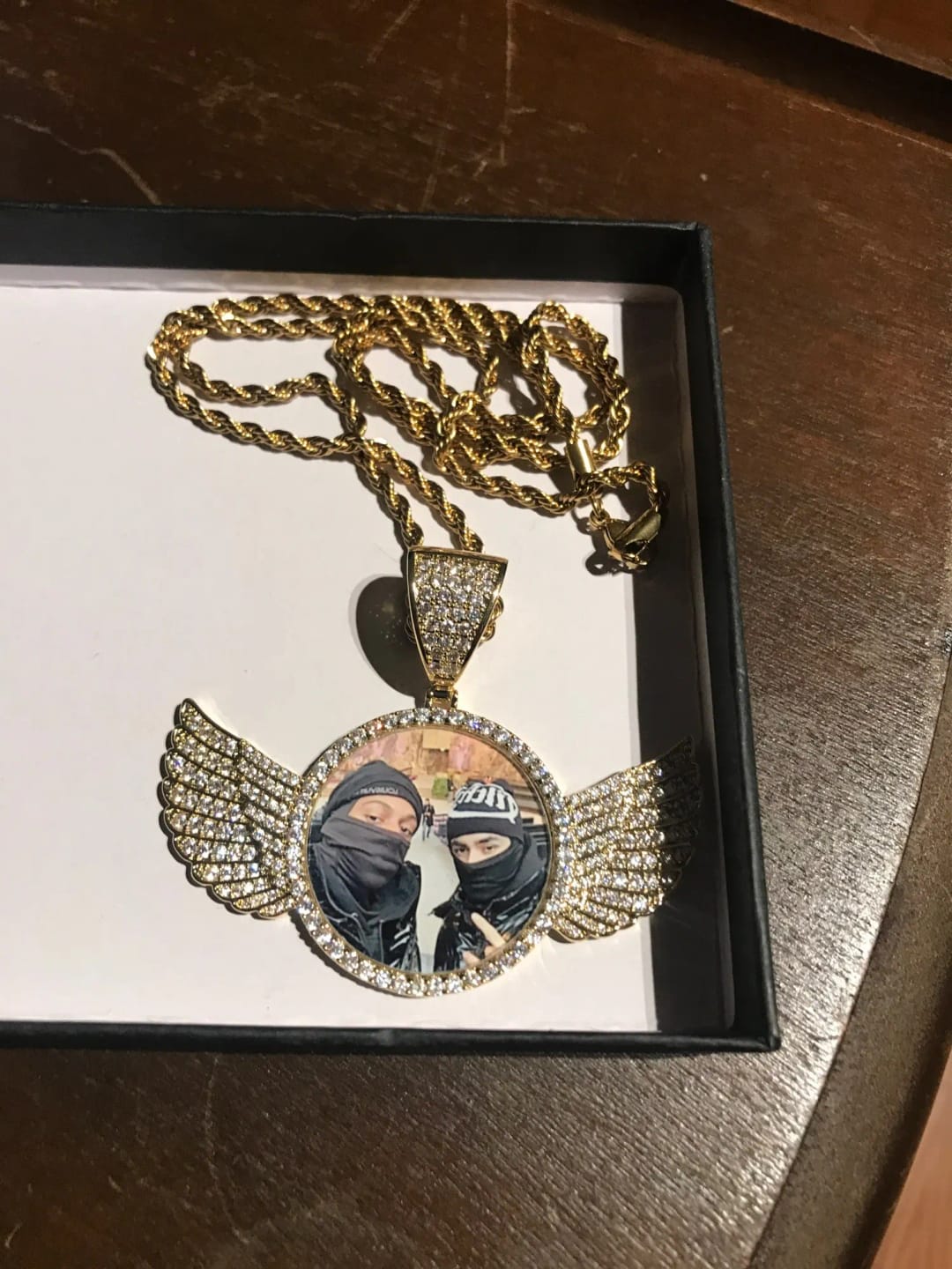 Customer photo review of ANGEL VIRTUE-WINGS CUSTOM PHOTO NECKLACE