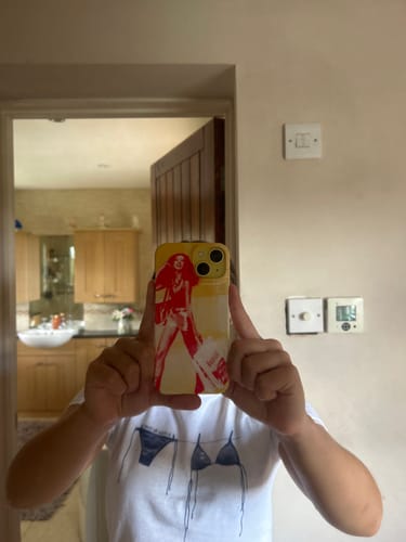 Customer photo review of 'Retail Therapy' phone case
