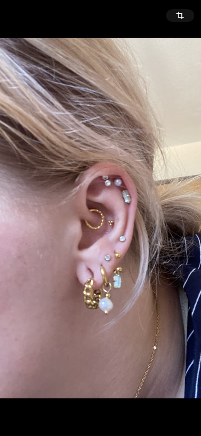 Customer photo review of Shining Point Piercing | Titan
