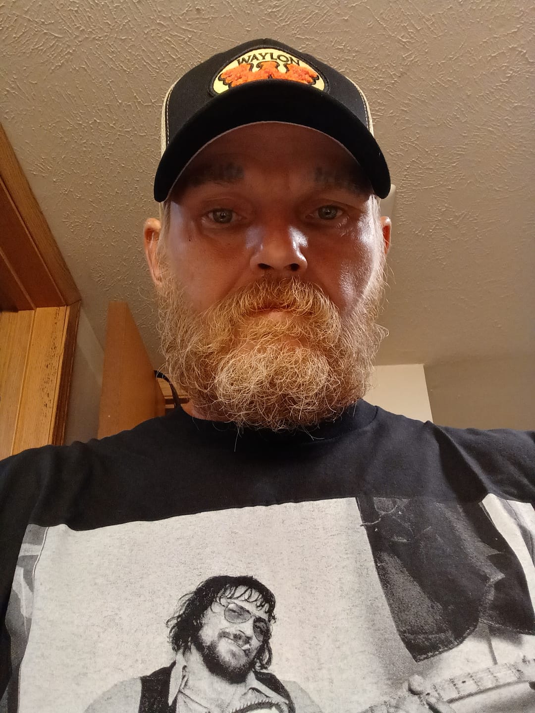 Customer photo review of Flying W Patched Waylon Jennings Trucker Hat