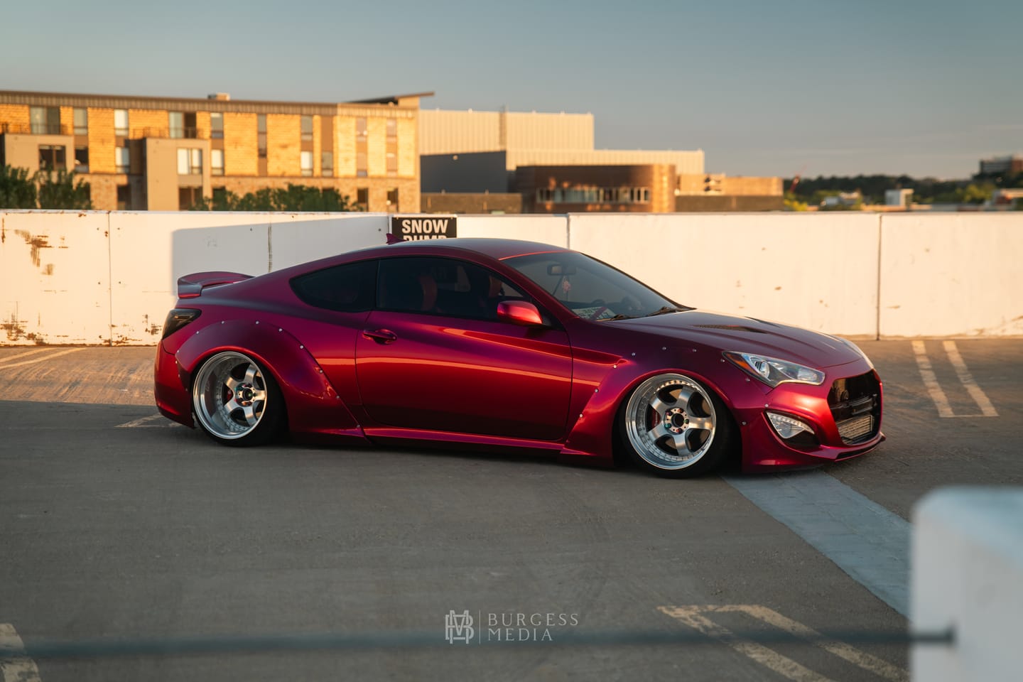 Customer photo review of Glossy Metallic Rubellite Purple Vinyl Wrap