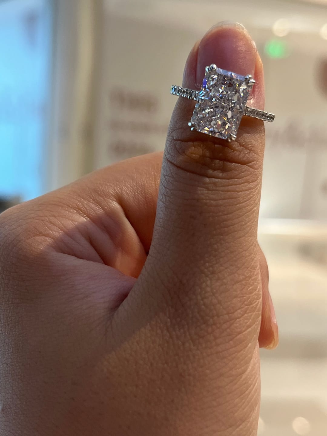 Customer photo review of S925 4.5Ct Radiant Cut Engagement Ring Moissanite/Simulated Diamond Solitaire Stackable Travel Ring For Women