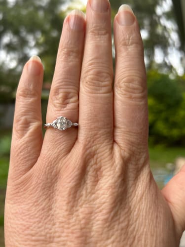 Customer photo review of Oval Moissanite With Marquise Petals Accents Engagement Ring