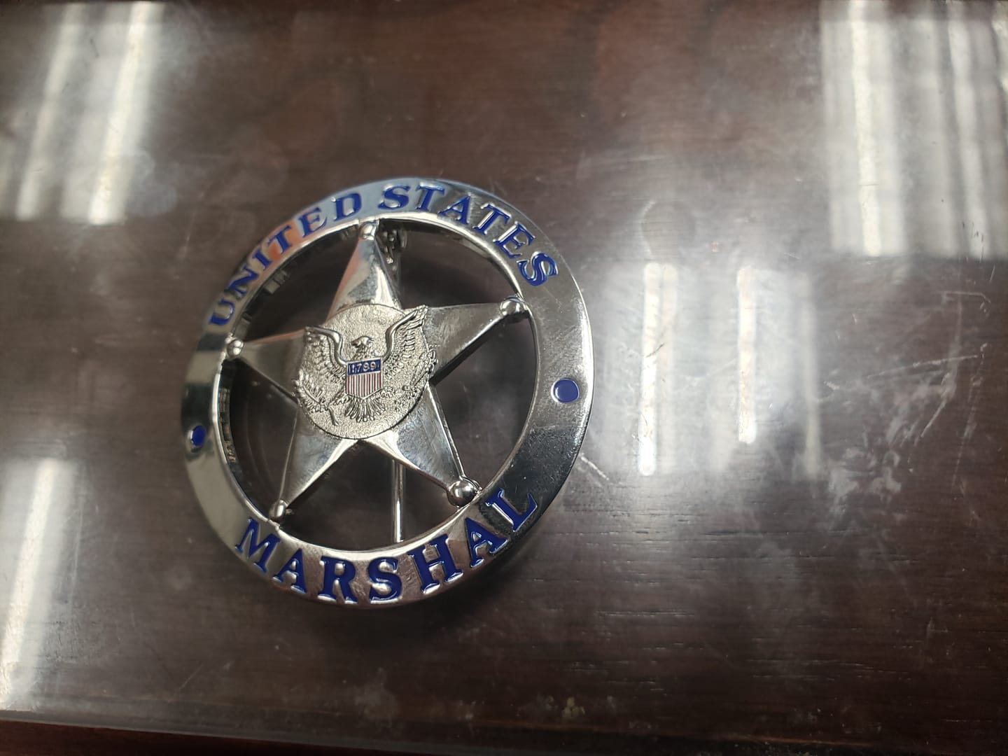 Customer photo review of US Federal Court Law Enforcement MARSHAL Badge Solid Copper Replica Movie Props